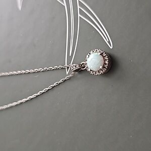 Helzberg opal necklace and earrings